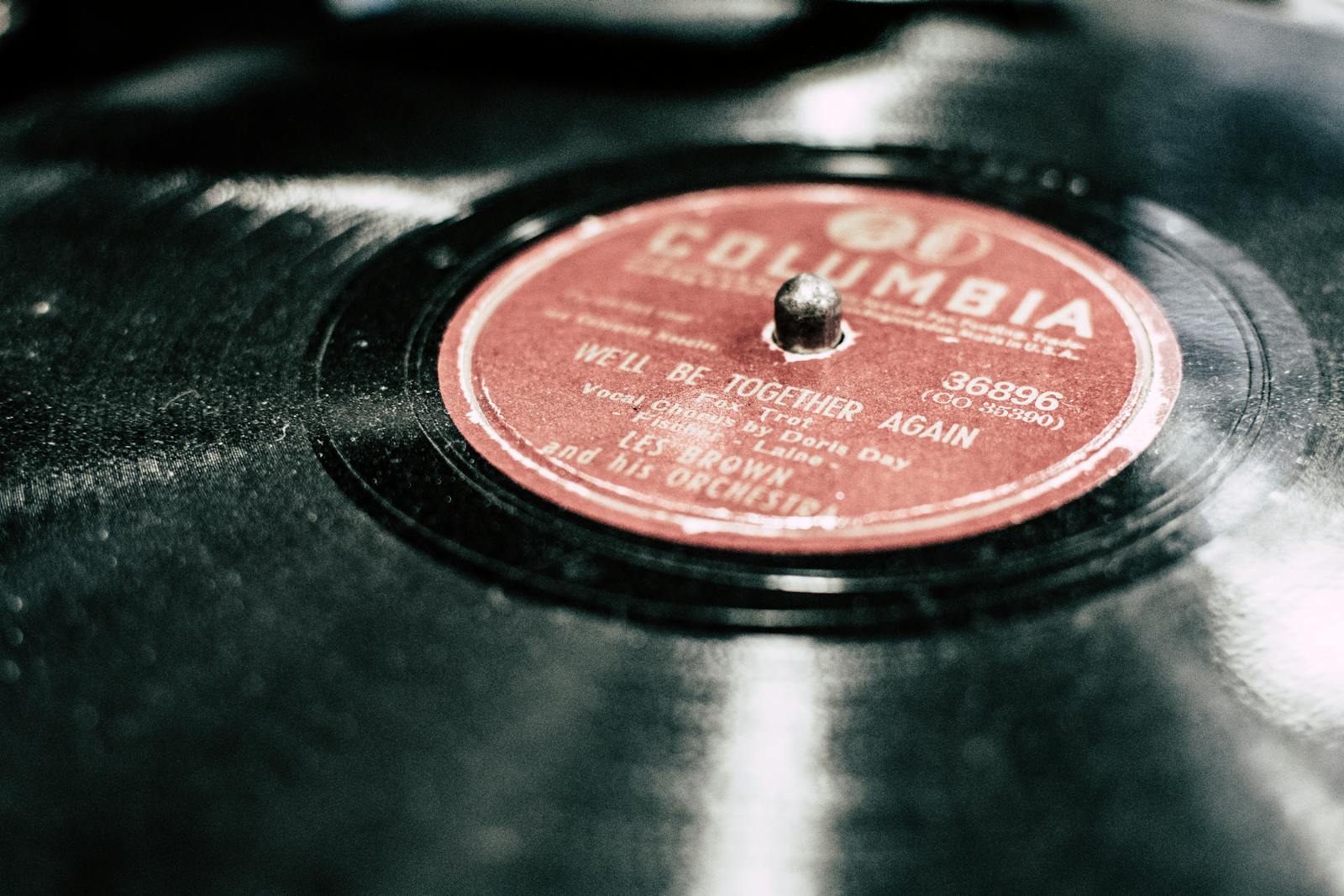 A detailed close-up of a classic Columbia vinyl record, highlighting the label.